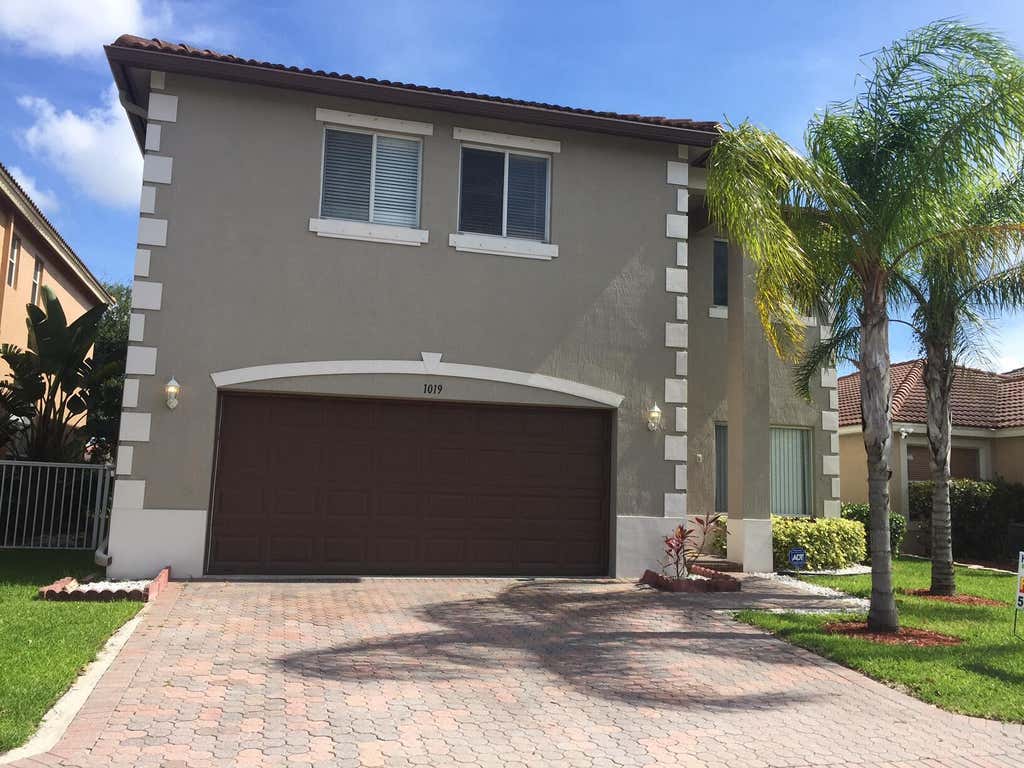 Photo of 1019 Big Torch Street, Riviera Beach, FL 33407 (MLS # B26038795)