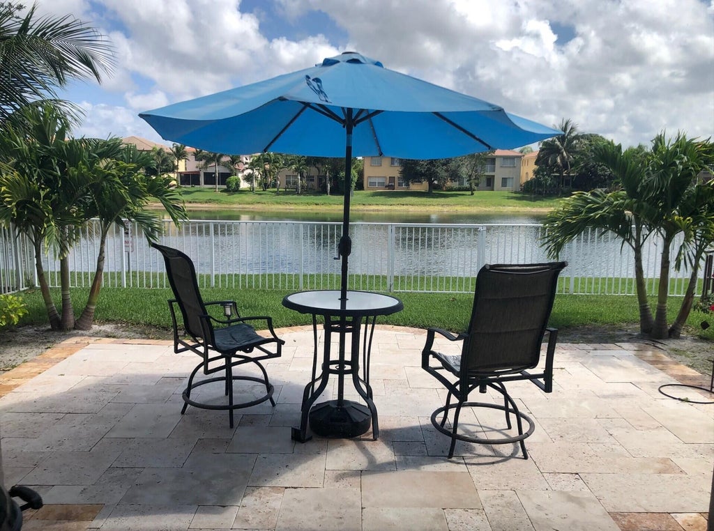Photo of 1019 Big Torch Street, Riviera Beach, FL 33407 (MLS # B26038795)