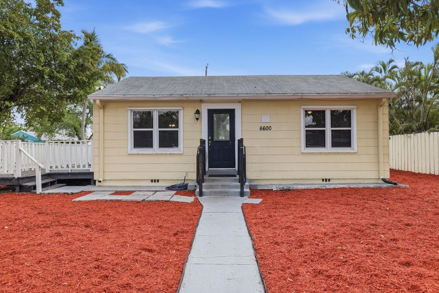 Opportunity, location, and potential come together in this well-positioned corner lot property just minutes from the beaches. This single-story home features 3 bedrooms, 2 bathrooms, and a functional layout designed for comfortable everyday living.  The home offers a spacious living area, porcelain tile flooring throughout the main living spaces, and a kitchen that opens nicely to the living and dining areas. The primary suite includes its own bath and generous closet space, while the additional bedrooms provide flexibility for guests, family, or a home office.  Step outside to enjoy a fully fenced yard, perfect for pets, entertaining, or simply relaxing. The patio and deck area offer additional outdoor living space, and the corner lot provides extra room and privacy.   Recent improvements include a newer A/C, newer water heater, and an updated electrical panel, providing added value and peace of mind. With solid bones and great layout, this home presents a fantastic opportunity for buyers looking to personalize a property in a desirable location.  Whether you're a primary homeowner, investor, or someone looking for a beach-area property with potential, this home is full of possibilities. Conveniently located near shopping, dining, and just a short drive to the beaches, this is a great opportunity to own in an established area.