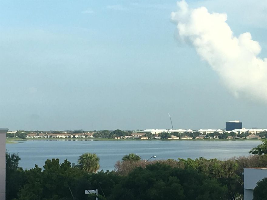 Beautiful CORNER unit at Montecito luxury lifestyle condominium! Renovated and upgraded WATERFRONT unit, located on the 4th floor, with panoramic water views on lake from private balcony. Direct sunset view. Recently upgraded 2 bedroom 2 bathroom split floor plan. Very bright and clean, with new premium wood floors throughout, new stainless steel appliances, new high efficiency A/C and new water heater. NO CARPET, NO TRAIN NOISE. All utilities included in the rent, except FPL. High speed fiber-optic internet, direct-TV all at no extra cost. Building offers 24-hr concierge service, internet cafe, fitness, sauna, heated pool, spa, clubhouse with pool table. NO PETS per condo rules. Walking distance to City Place, downtown, shops and restaurants. 5 minutes drive to PBI, 12 mins to beach