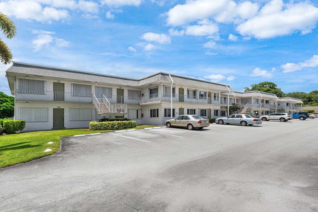 Photo of 3160 LAKE OSBORNE Drive #Bldg 6 Unit 206, Lake Worth Beach, FL 33461 (MLS # B26058628)