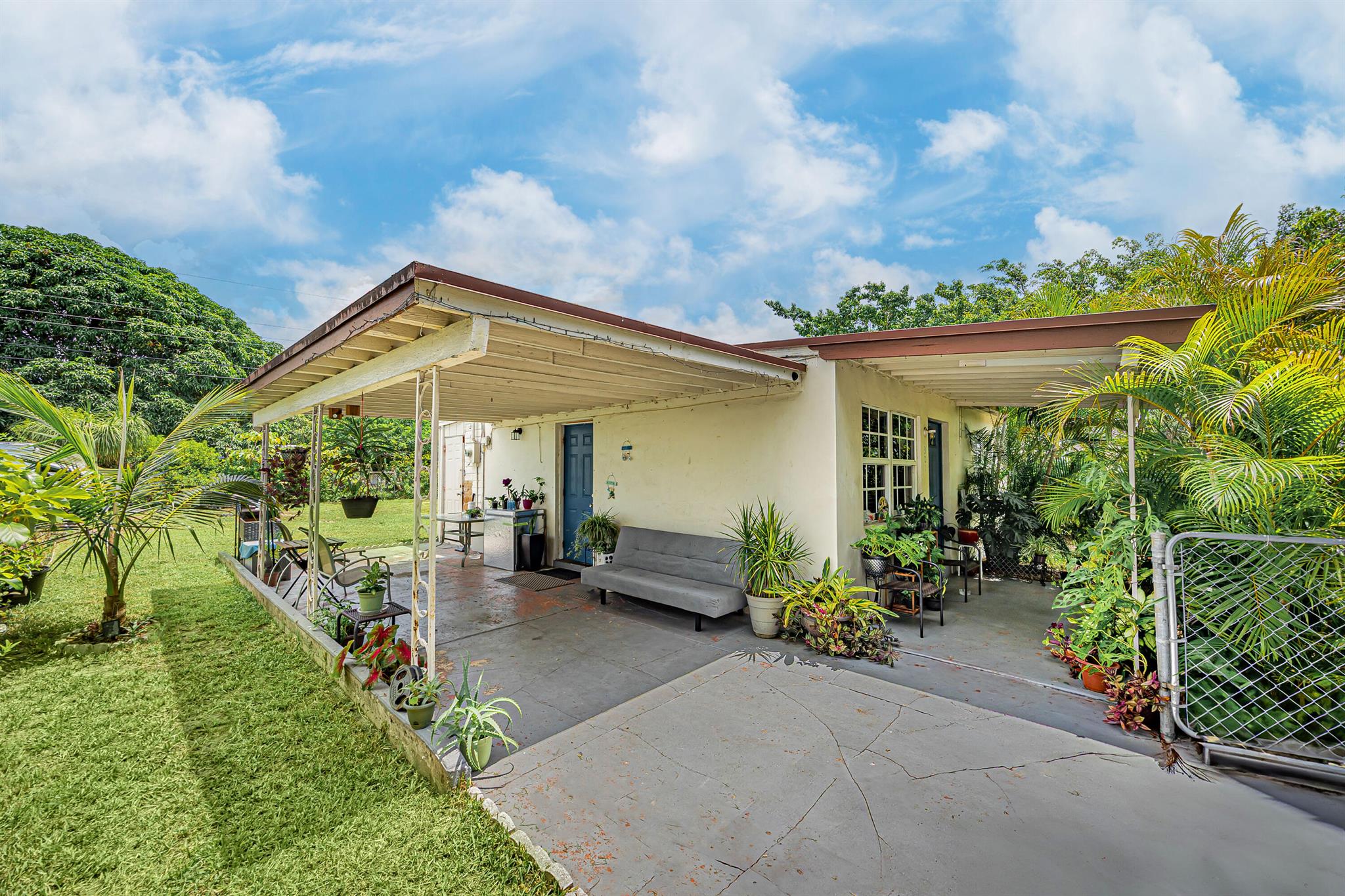 Investor opportunity in East Lantana! This 2 bed, 1 bath single-family home features stainless appliances, laminate floors, a spacious yard, carport, and covered porch. Ideally located just minutes from I-95 and the beach. Excellent tenant in place through February 2026 provides immediate rental income. No HOA. AC 2021 - WATER HEATER IS 2024-
