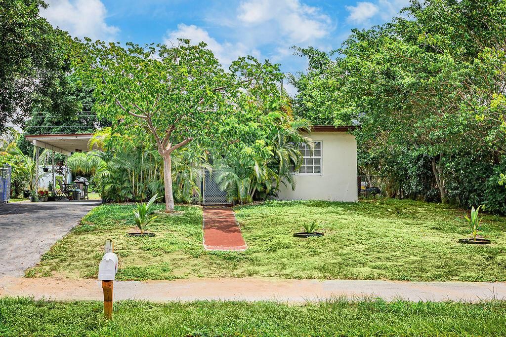 Photo of 301 Mentone Road, Lake Worth, FL 33462 (MLS # R11107512)