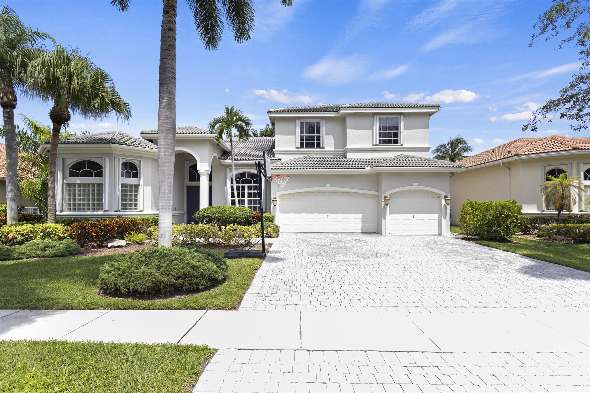 Welcome to Avalon! This stunning 5-bedroom, 4-bath home + office offers over 3,300 square feet of elegant living space. Step inside to soaring ceilings and an abundance of natural light. The newly renovated kitchen features modern finishes and opens seamlessly to spacious living and dining areas.The outdoor retreat is perfect for entertaining, boasting a sparkling in-ground pool, summer kitchen, and expansive green space. Enjoy peace of mind with a low HOA that covers internet, cable, phone, ADT security, and common areas. Ideally located, the home is zoned for top-rated schools, within close proximity to beaches, shopping, and dining.