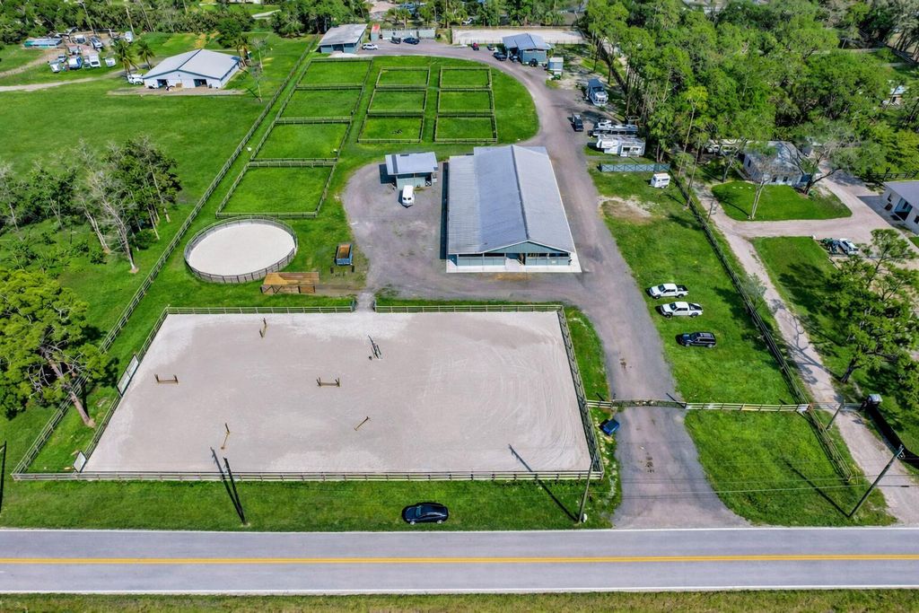 Photo of 14845 Collecting Canal Road, Loxahatchee Groves, FL 33470 (MLS # R11148742)