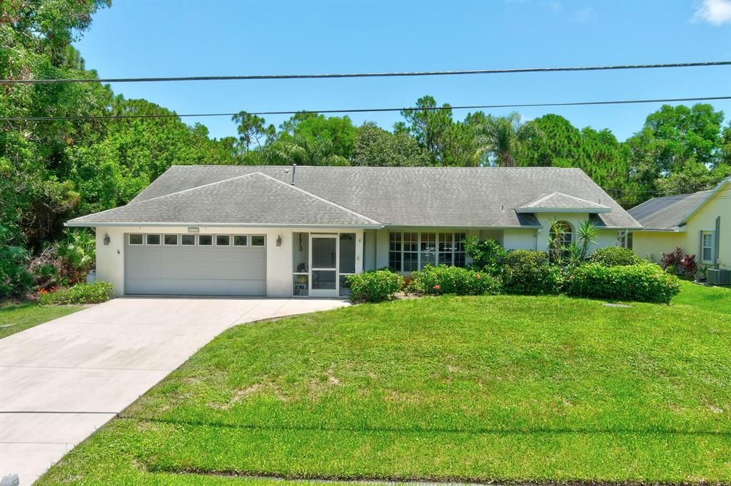 Photo of 4988 NW Flintstone Avenue, Port Saint Lucie, FL 34983 (MLS # R10731475)