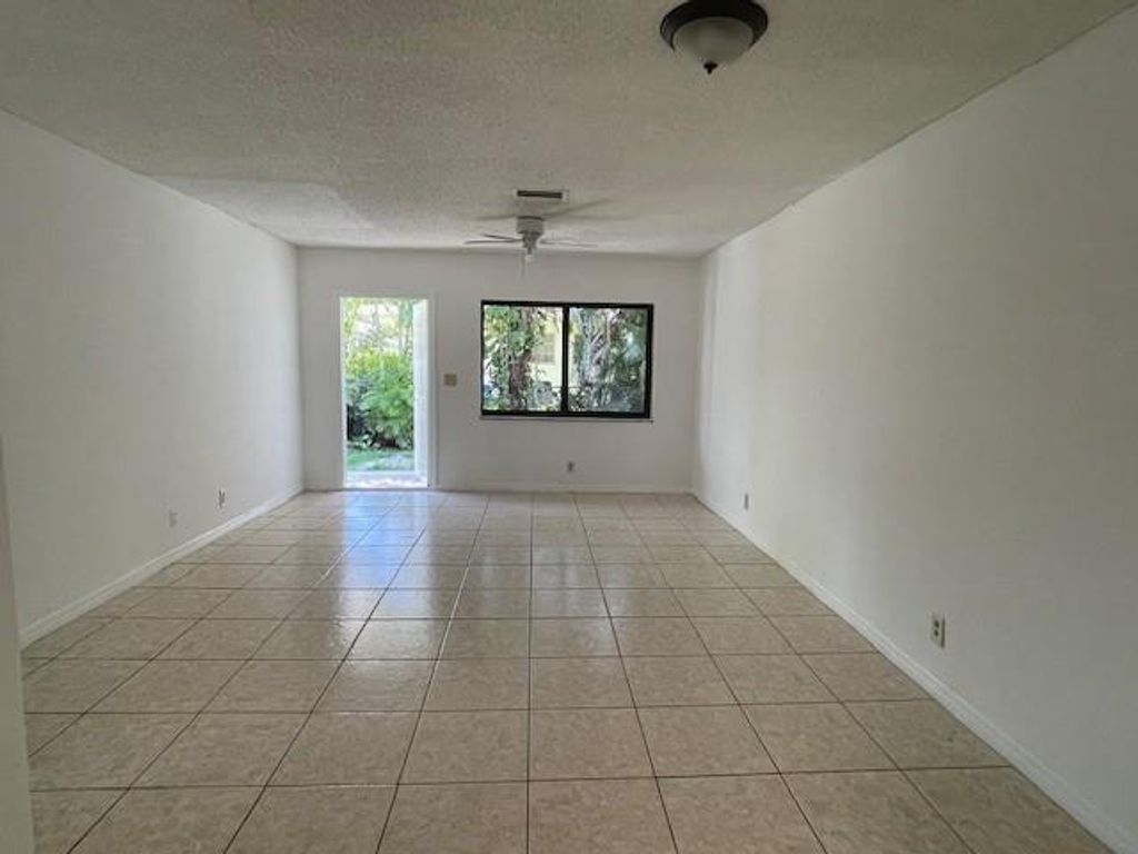 Photo of 3741 Riverside Drive #B, Coral Springs, FL 33065 (MLS # F10488504)