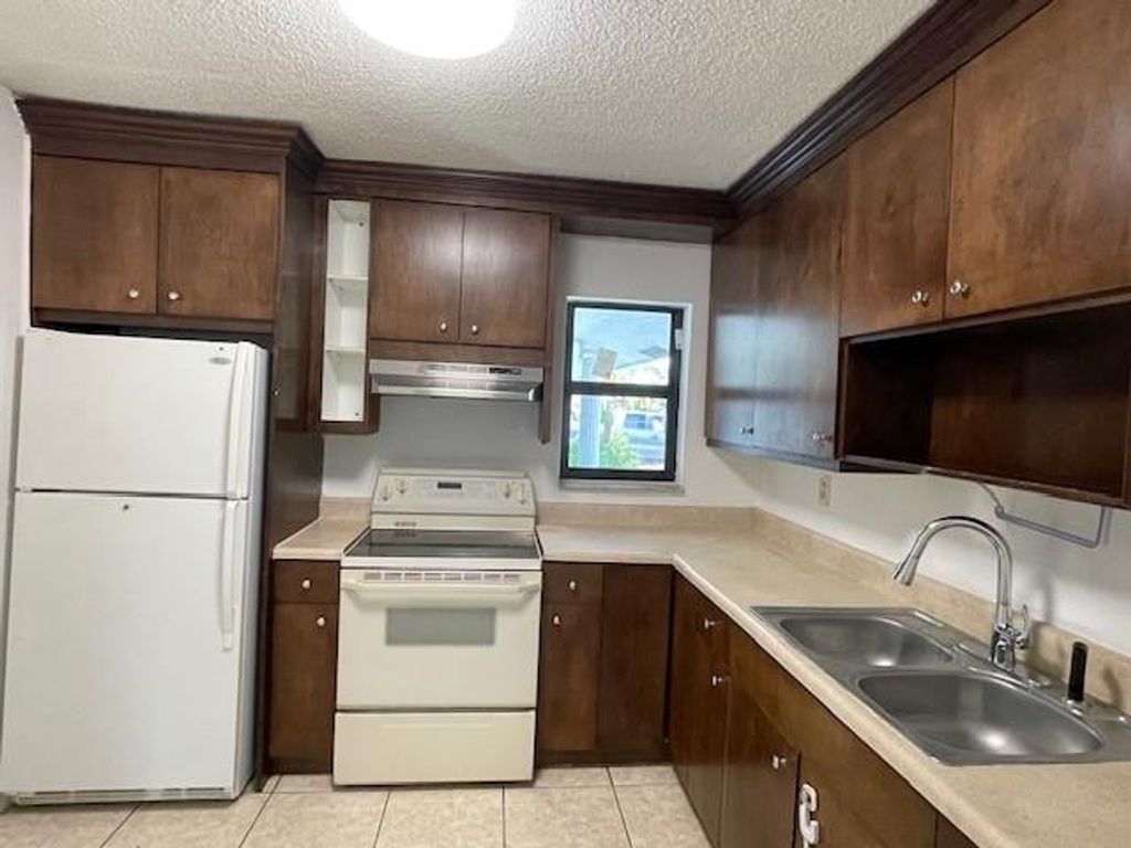 Photo of 3741 Riverside Drive #B, Coral Springs, FL 33065 (MLS # F10488504)