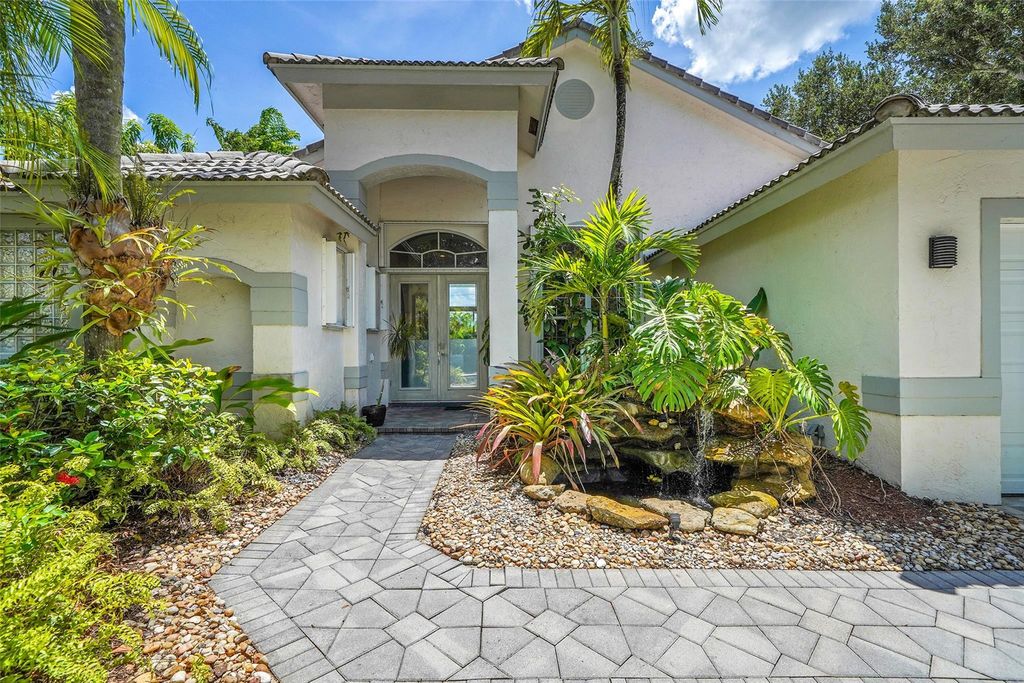Photo of 3039 Lakewood Drive, Weston, FL 33332 (MLS # F10508025)