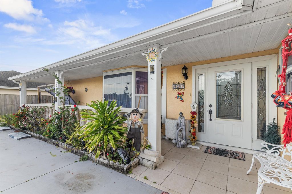 Photo of 2044 SW Idaho Lane, Port Saint Lucie, FL 34953 (MLS # R11006211)