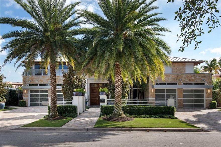 Stunning contemporary newer construction residence built by renowned luxury builder. This 100' deep water home was built in 2015 & meticulously improved upon with luxurious home theatre, 24,000 LB boat lift, 350 bottle wine storage & humidor. European chefs kitchen w/ oversized island & high-end appliances. A tasteful & rich combination of marble & wood flooring, custom floating staircase, two spacious family rooms w/ sleek gas fireplace, private elevator w/ many more bells & whistles that are sure to please. Six generous sized bedrooms, lavish master bathroom w/ glass enclosed shower w/ body sprays. Salt water pool w/spa, modern pool side gazebo w/ full tropical kitchen, generator, walled entrance w/ double driveway, marble pavers & a 4-car garage.