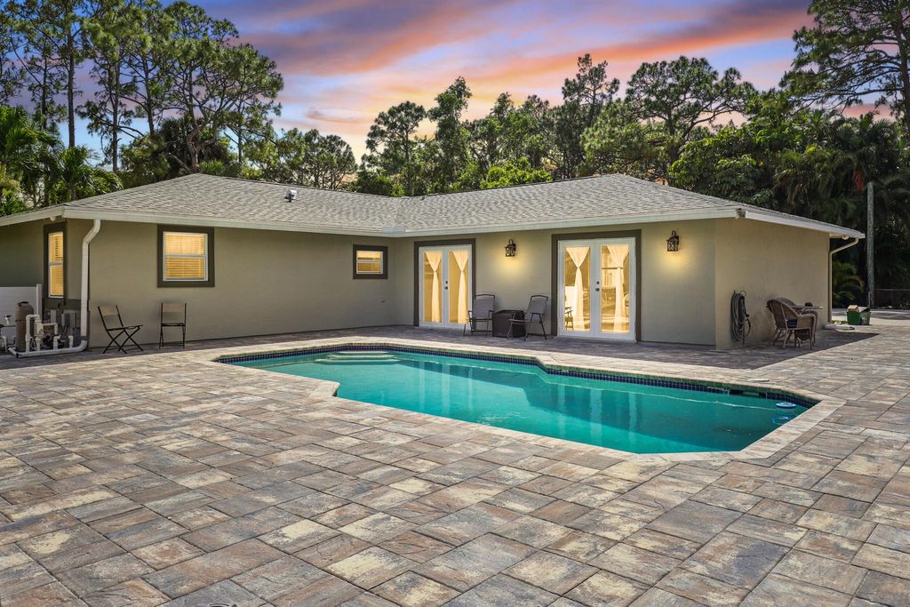 Photo of 12109 53rd Road N, The Acreage, FL 33411 (MLS # R11105281)