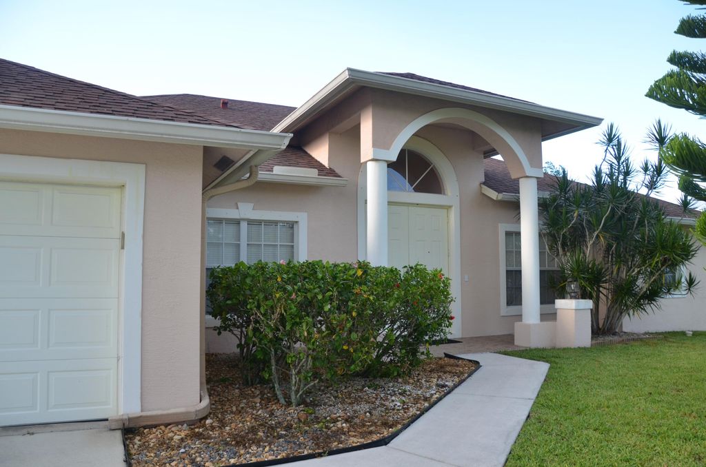 Photo of 5776 NW Eskimo Circle, Port Saint Lucie, FL 34986 (MLS # R10818351)