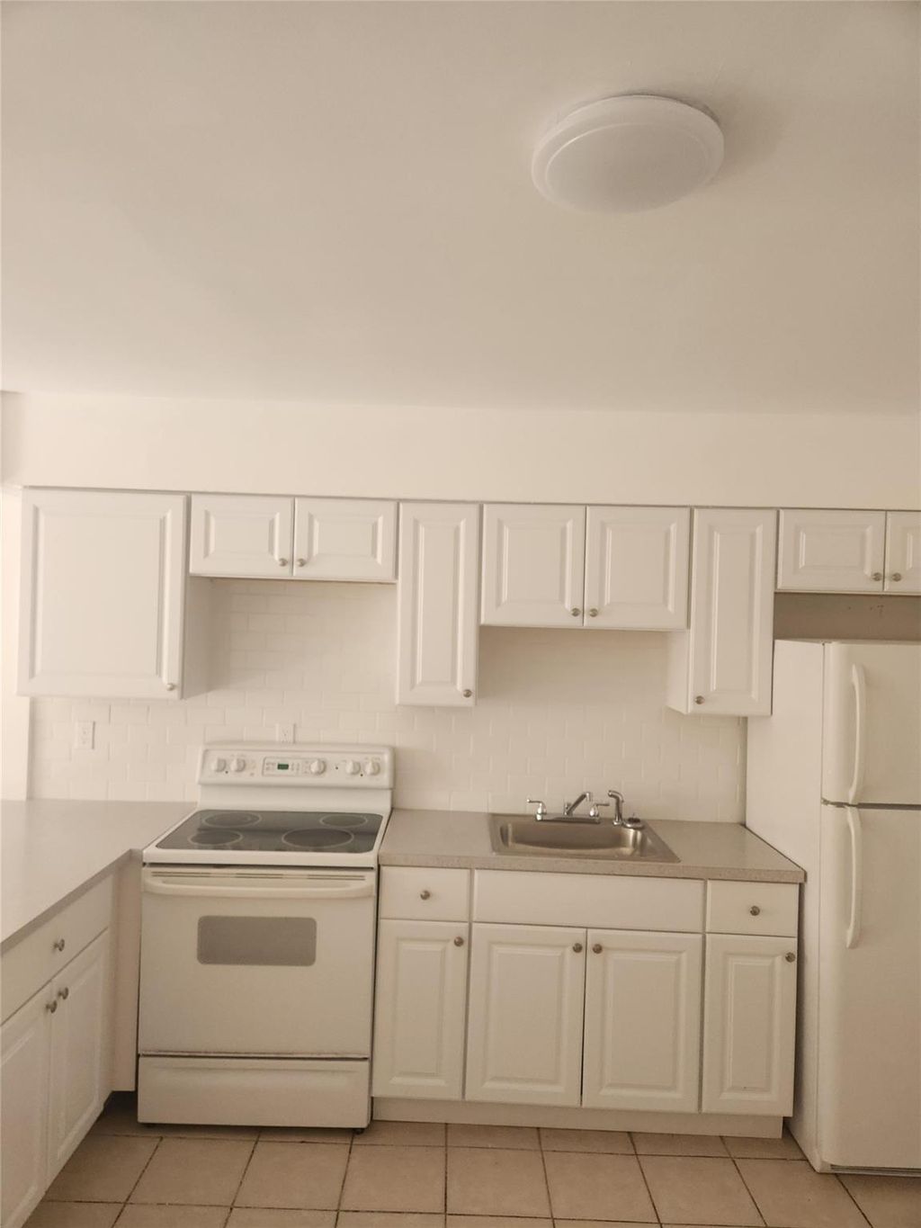 Photo of 511 Silver Beach Road, Lake Park, FL 33403 (MLS # F10480134)