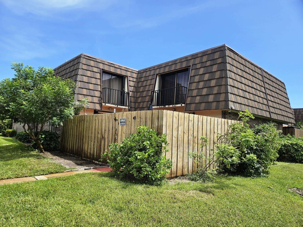 Photo of 1540 FOREST LAKES Circle #D, West Palm Beach, FL 33406 (MLS # B26073424)