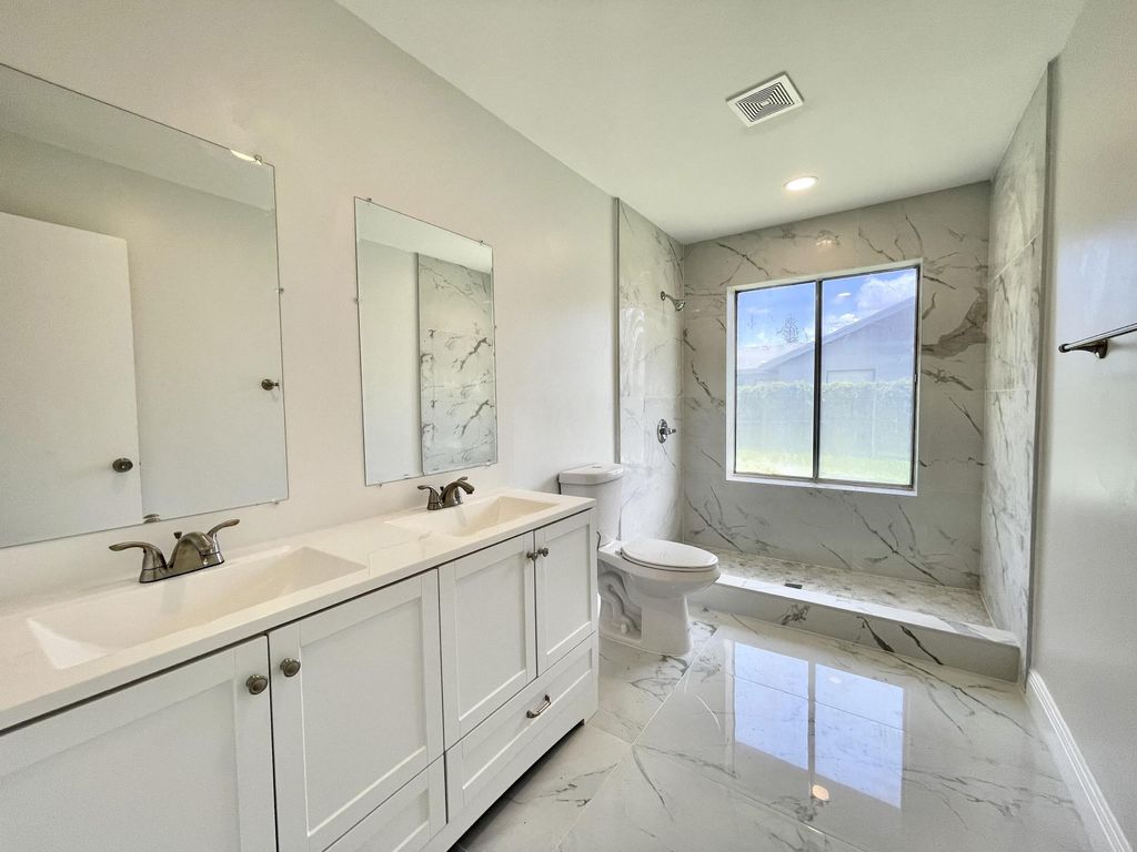 Photo of 7150 NW 46th Court, Lauderhill, FL 33319 (MLS # B26009113)