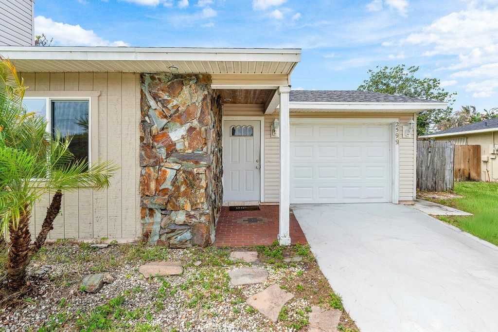 Photo of 2599 SE Grand Drive, Port Saint Lucie, FL 34952 (MLS # B26016367)