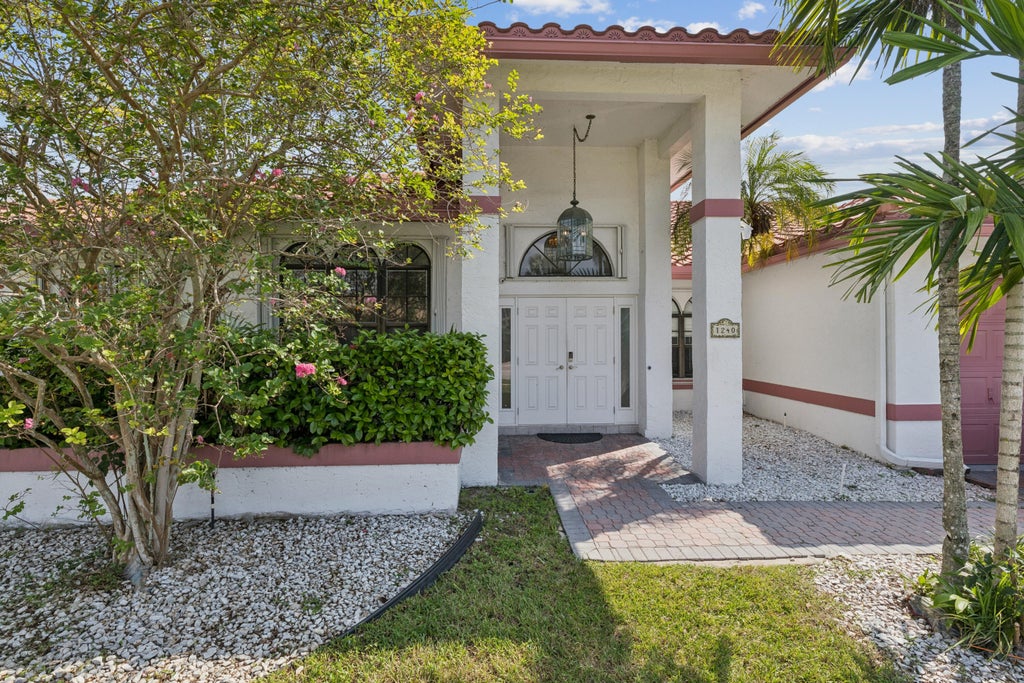 Photo of 1240 NW 100TH Way NW, Plantation, FL 33322 (MLS # B26087595)