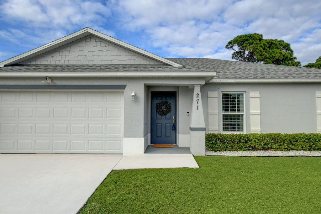Photo of 271 SW Todd Avenue, Port Saint Lucie, FL 34983 (MLS # R10943854)