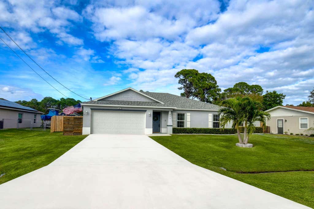 Photo of 271 SW Todd Avenue, Port Saint Lucie, FL 34983 (MLS # R10943854)