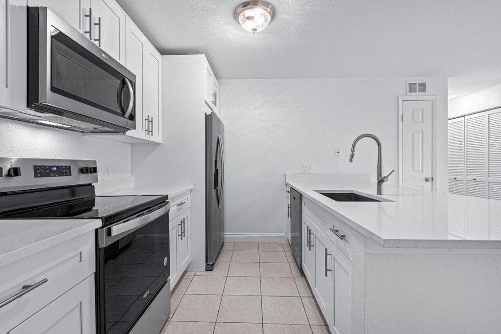 Photo of 1865 Palm Cove Boulevard #9-207, Delray Beach, FL 33445 (MLS # R11058186)