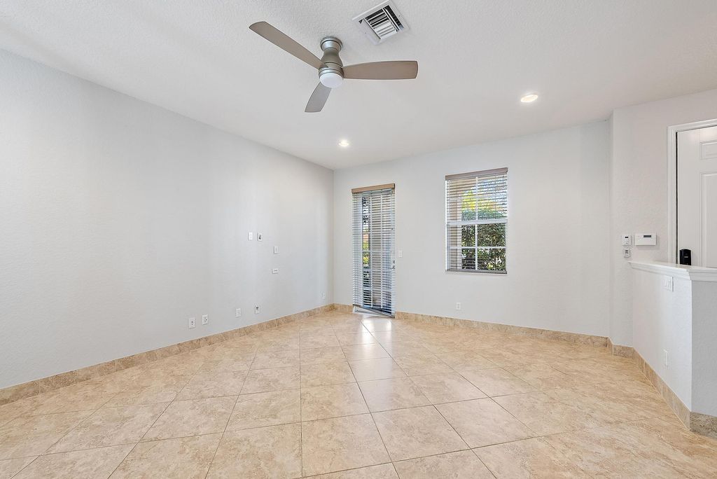 Photo of 147 Mulligan Place, Jupiter, FL 33458 (MLS # R11161960)