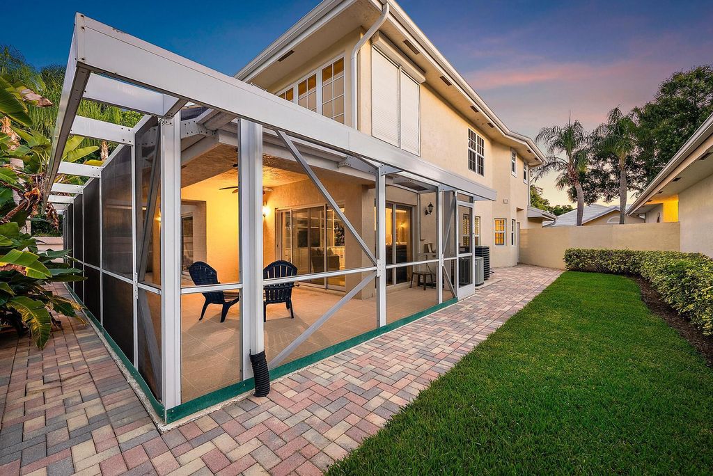 Photo of 230 Canterbury Drive W, Palm Beach Gardens, FL 33418 (MLS # R11101392)