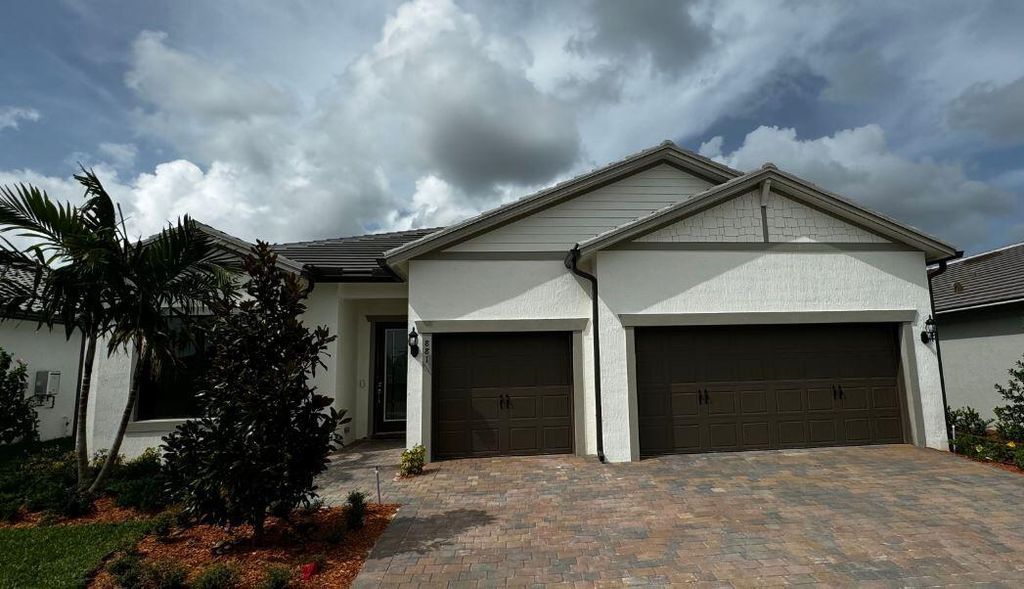Photo of 881 SE Courances Drive, Port Saint Lucie, FL 34984 (MLS # R11006200)