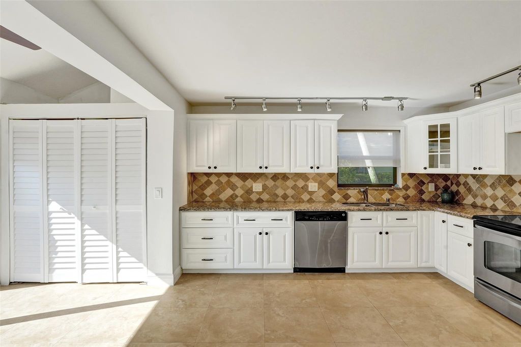 Photo of 2095 Deer Creek Woodlands Way #2095, Deerfield Beach, FL 33442 (MLS # F10538626)