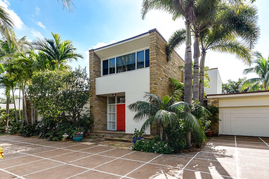 Unique Prairie style house on large lot with many restored original details including terrazzo floors cypress paneling and more. Large scale and bright rooms. Covered pool porch area surrounded by lush garden. Deeded beach and direct lake trail access.