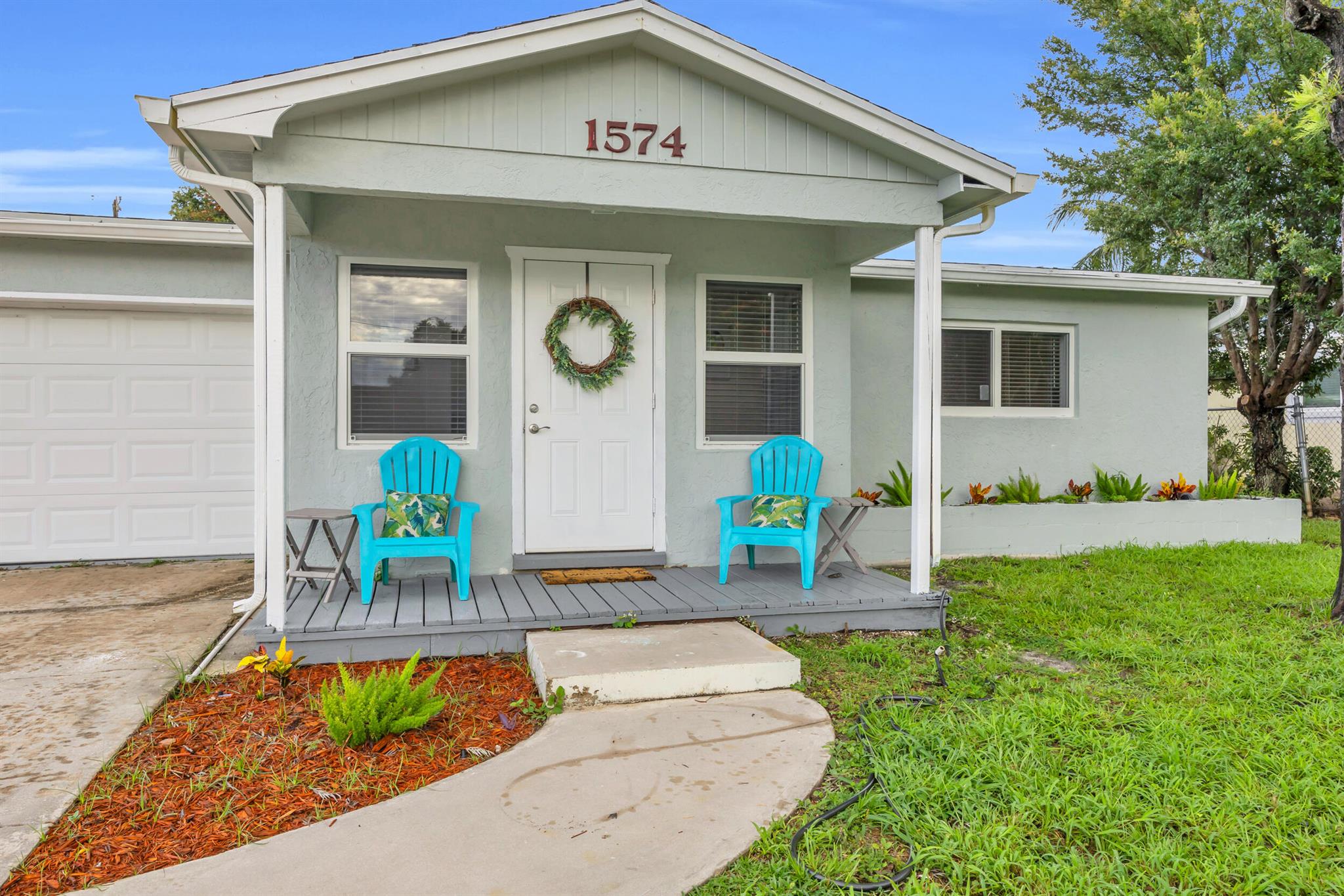 Welcome to this stunning, fully remodeled home nestled in a quiet neighborhood of desirable Jensen Beach. Featuring high-end finishes throughout, this residence offers a brand-new kitchen with stainless steel appliances, quartz countertops, and modern cabinetry. The open layout, fresh flooring, and elegant design create a warm and sophisticated living space. The open-concept layout flows seamlessly into a spacious backyard--perfect for entertaining, outdoor dining, or simply enjoying the Florida lifestyle. Just minutes from the beach, shopping, and dining--this home offers luxury and tranquility in one perfect location. Don't miss out--schedule your showing today!