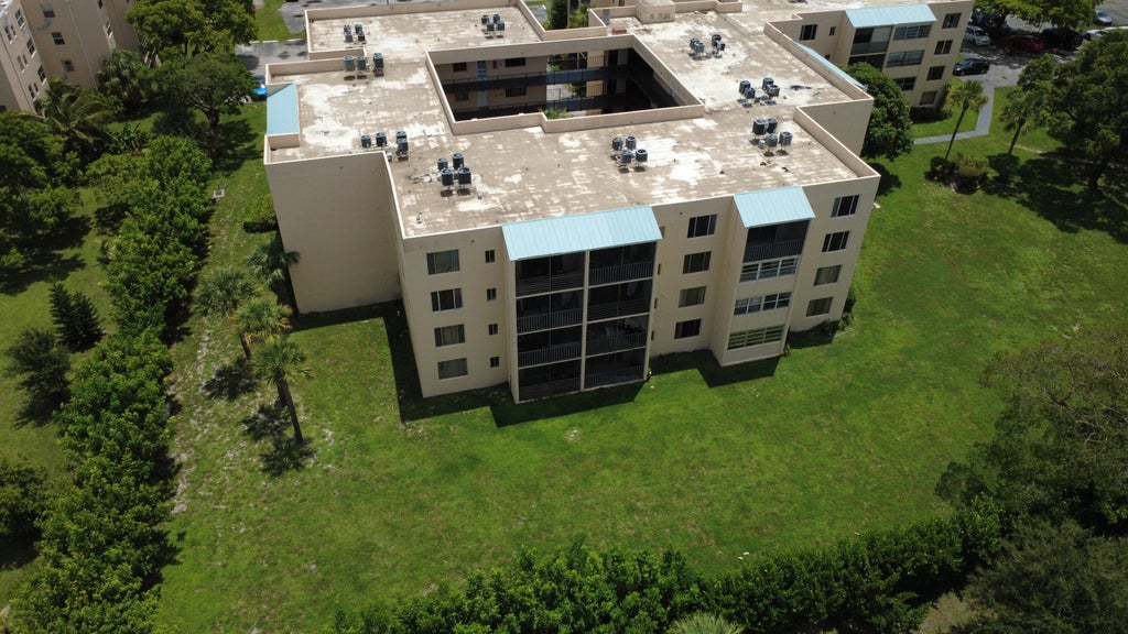 Photo of 2830 SOMERSET Drive #104N, Lauderdale Lakes, FL 33311 (MLS # B26057466)