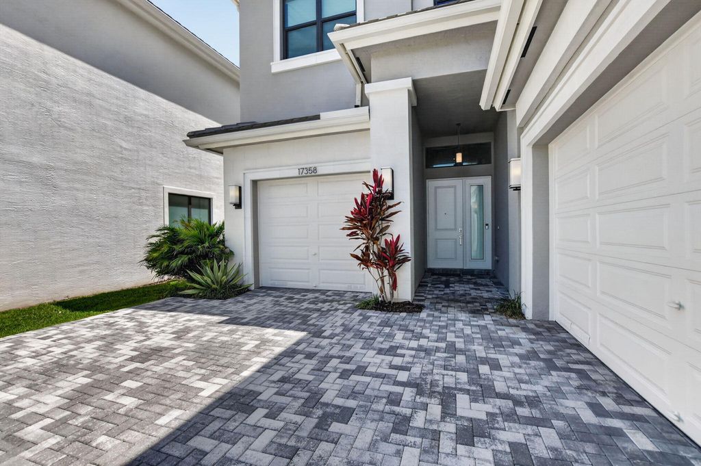 Photo of 17358 Santaluce Manor, Boca Raton, FL 33496 (MLS # B26015741)