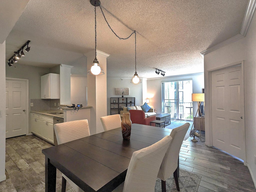 Photo of 630 S SAPODILLA Avenue #308, West Palm Beach, FL 33401 (MLS # B26075105)