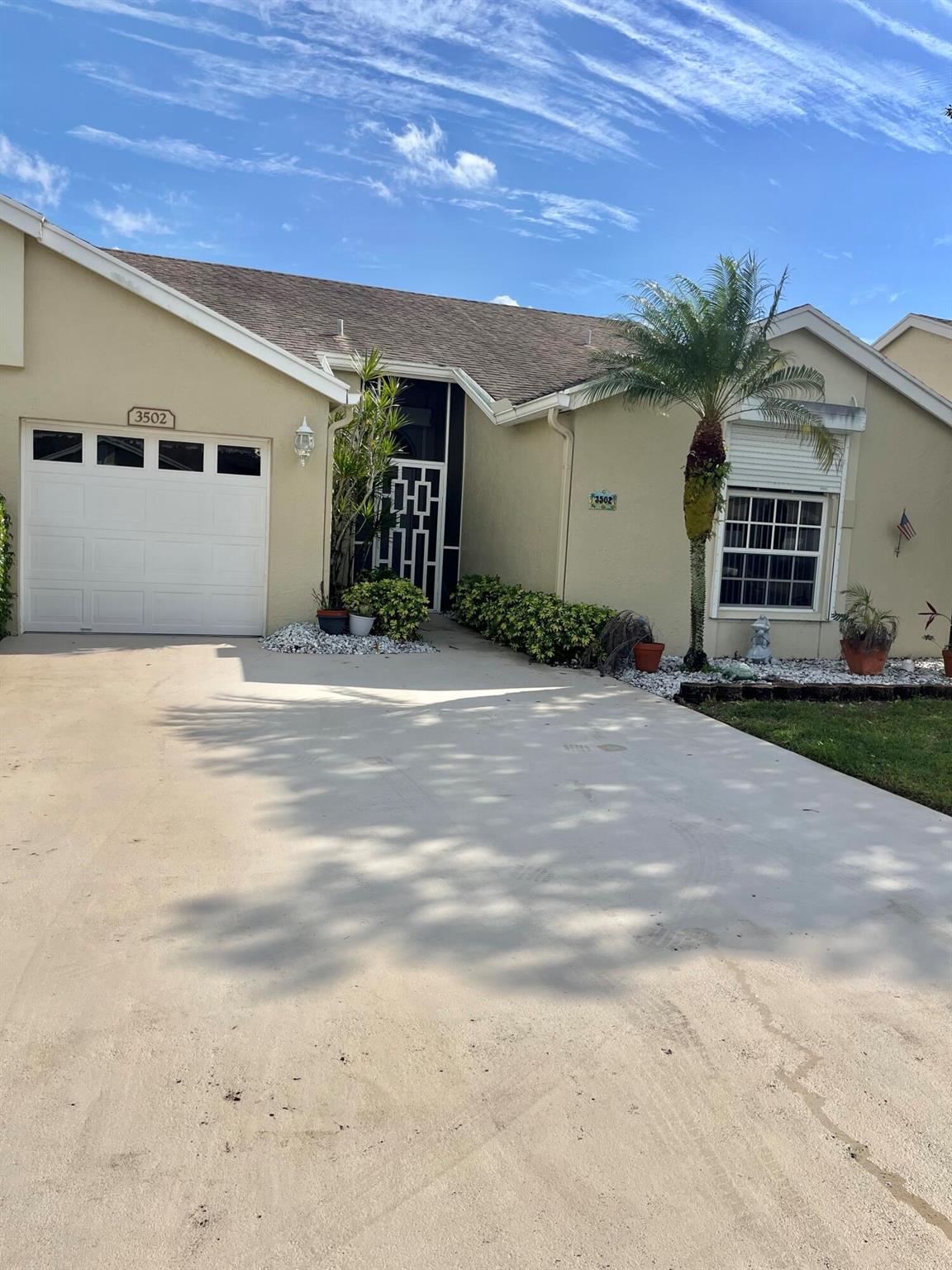Beautiful Large 1 story Villa (townhome) 2 Bedrooms 2 Baths 1 car garage.full size Washer Dryer. Wonderful Vaulted Ceilings with sky light makes this home Light & bright. Eat-in-kitchen & also dinning area. Screened Patio with view of lake. Come take a look 55+ active community
