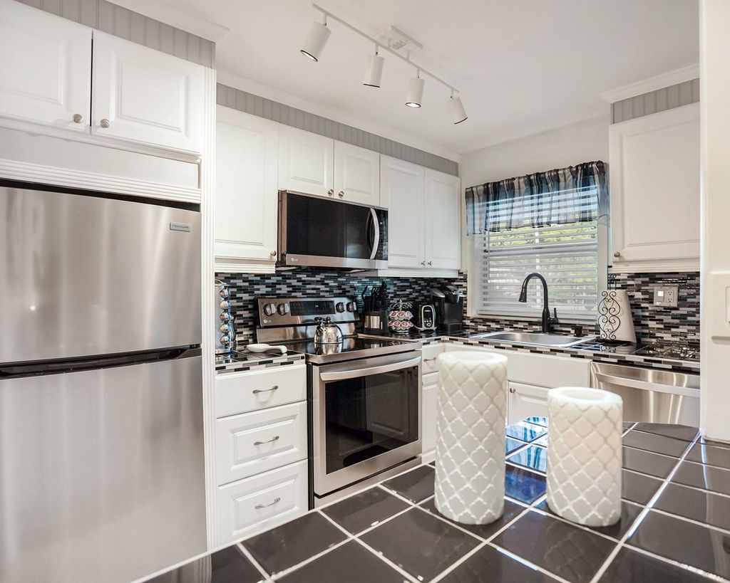 Photo of 9281 Sunrise Lakes Blvd #101, Sunrise, FL 33322 (MLS # F10539227)