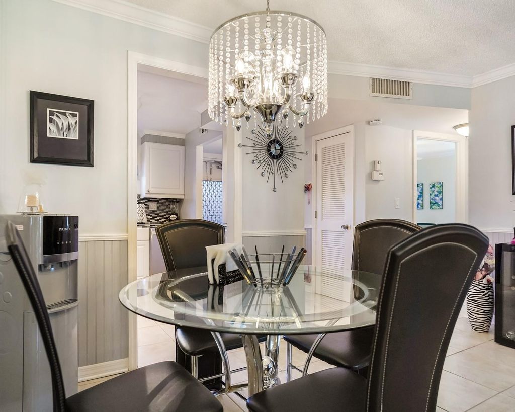 Photo of 9281 Sunrise Lakes Blvd #101, Sunrise, FL 33322 (MLS # F10539227)