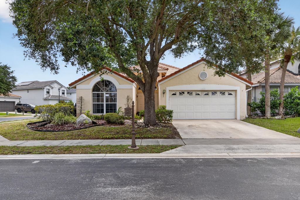 Photo of 10870 Old Bridgeport Lane, Boca Raton, FL 33498 (MLS # B26020130)