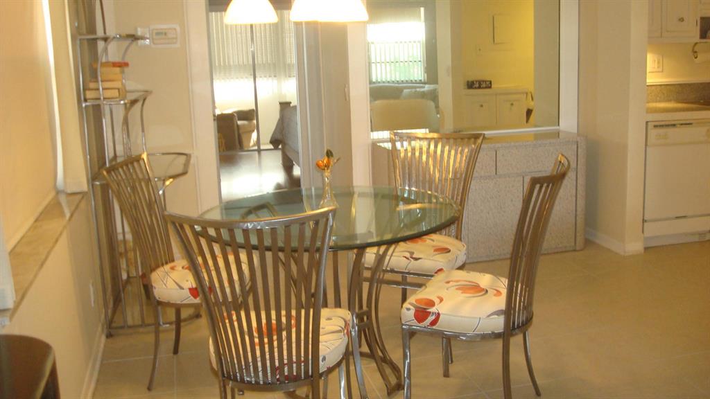Beautiful first floor unfurnished unit with large tile floor throughout. White kitchen with newer appliances. Full size washer and dryer are located in the patio closet. Located near the Flanders entrance close to shopping and restaurants. 55+ community with pools, tennis, pickleball,golf, gyms and much more!