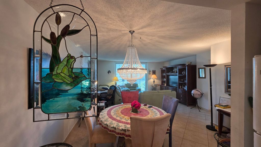 Photo of 100 Golden Isles Drive #714, Hallandale Beach, FL 33009 (MLS # B26025960)