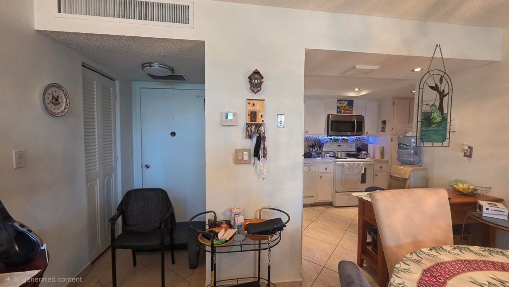 Photo of 100 Golden Isles Drive #714, Hallandale Beach, FL 33009 (MLS # B26025960)