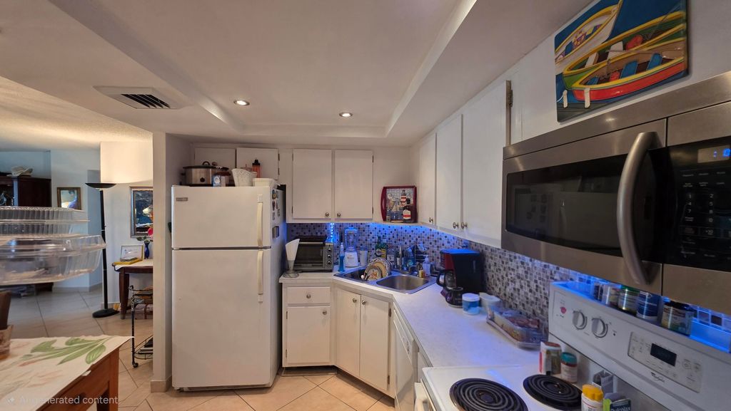 Photo of 100 Golden Isles Drive #714, Hallandale Beach, FL 33009 (MLS # B26025960)
