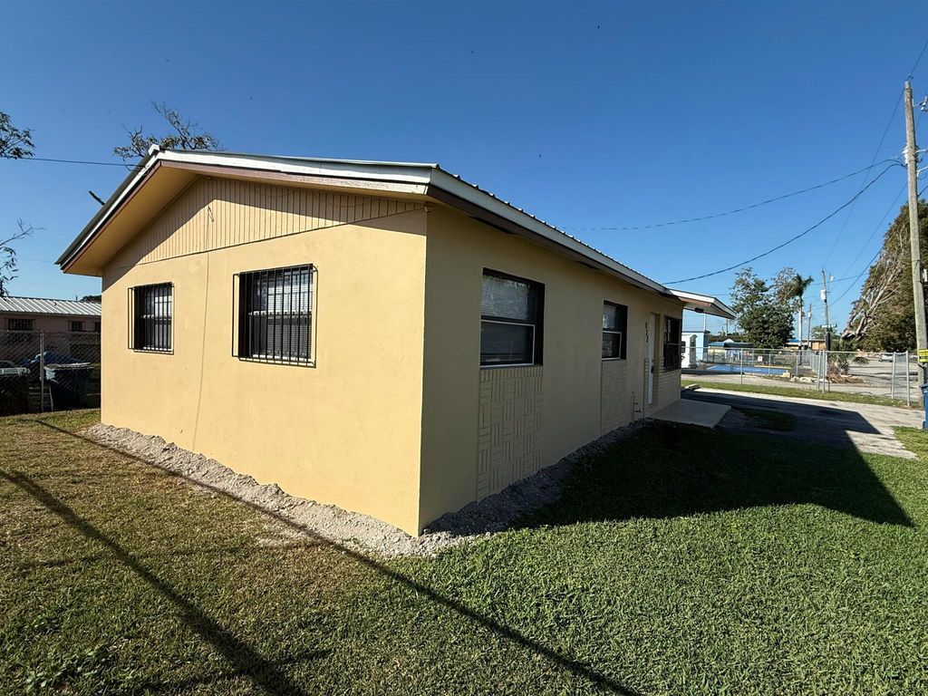 Photo of 832 SW Avenue B, Belle Glade, FL 33430 (MLS # R11058425)