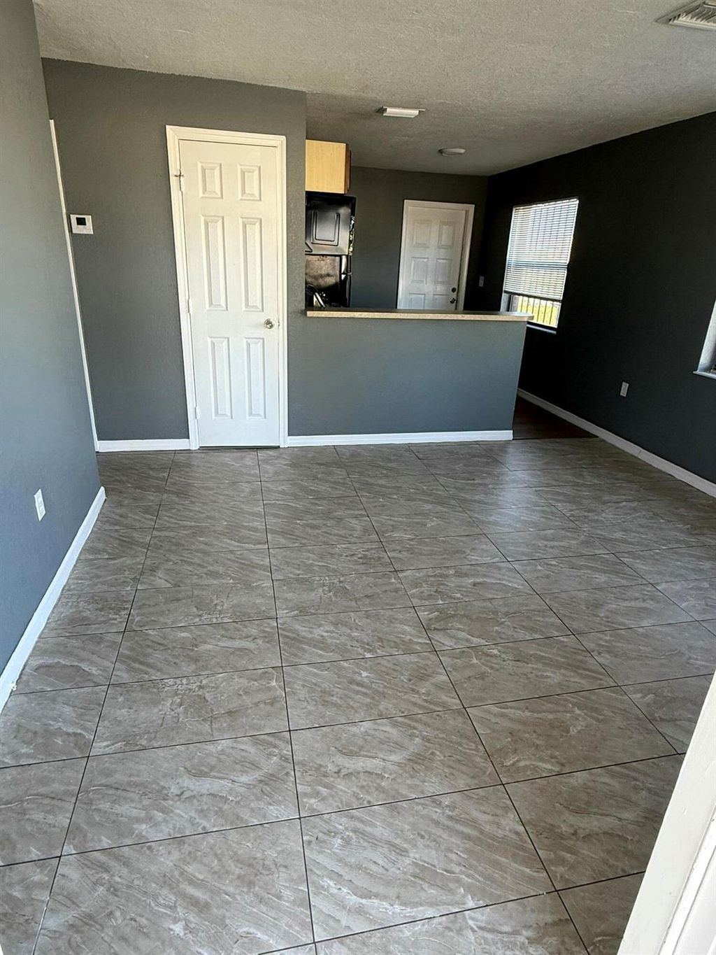 Photo of 832 SW Avenue B, Belle Glade, FL 33430 (MLS # R11058425)