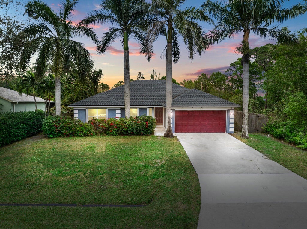 Photo of 1611 SW Glacador Avenue, Port Saint Lucie, FL 34953 (MLS # R11053143)
