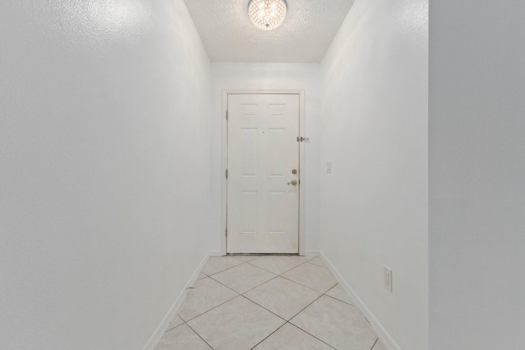 Photo of 1611 SW Glacador Avenue, Port Saint Lucie, FL 34953 (MLS # R11053143)