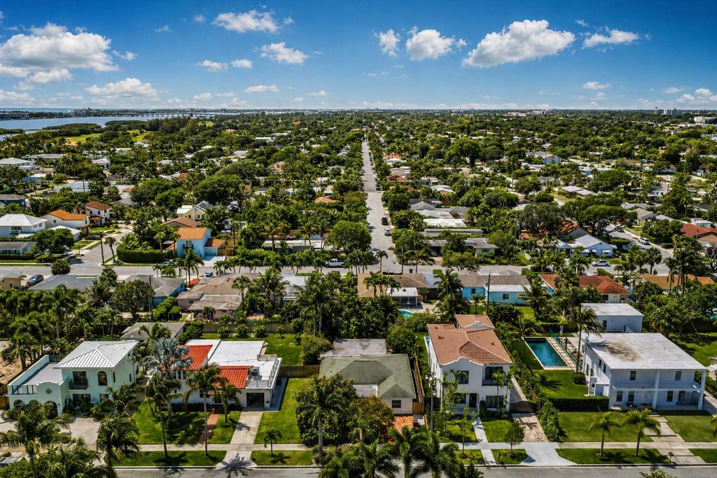 Photo of 137 Auburn Drive, Lake Worth Beach, FL 33460 (MLS # B26019932)