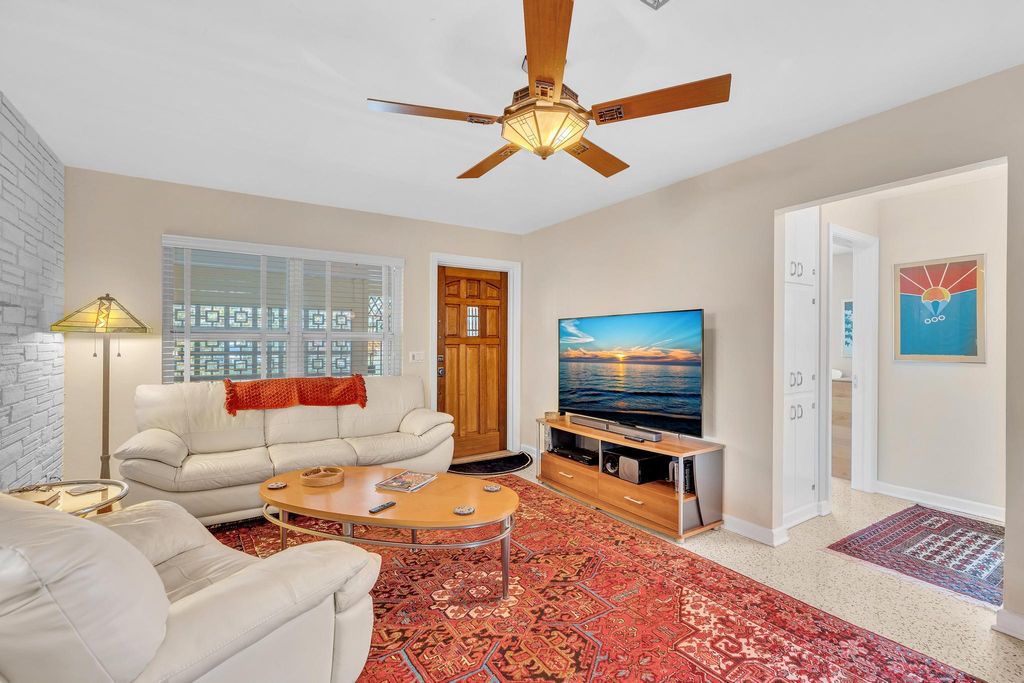 Photo of 137 Auburn Drive, Lake Worth Beach, FL 33460 (MLS # B26019932)