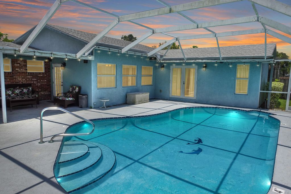 Photo of 3627 Catalina Road Rd, Palm Beach Gardens, FL 33410 (MLS # R10812578)