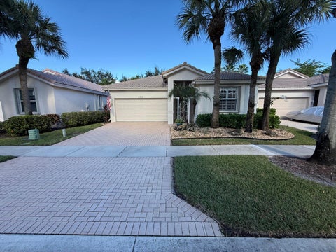 Photo of 2310 Sapphire Circle, West Palm Beach, FL 33411 (MLS # B26089408)